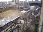 Used Can Filling Line for slim-line cans type 200/202, 150/250 ml.  Capacity 600 cans per minute.  Comprised of:  (1) Kettner depalletizer, (1) Vroemisse can conveyor, (1) Vroemisse rinser, (1) KHS H...