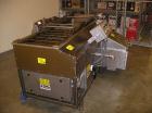 Used Complete Belshaw Century 200 Donut System, 153 dozen donuts per hour. Includes the following equipment:  Century fryer, model C200RH; Multi-Matic cutter with mobile lift carrier, model MDDRF4; C...