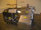 Used Complete Belshaw Century 200 Donut System, 153 dozen donuts per hour. Includes the following equipment:  Century fryer, model C200RH; Multi-Matic cutter with mobile lift carrier, model MDDRF4; C...