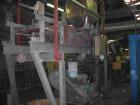 USED: Comac extrusion line. (1) Feeding system Matcon or Anag containers, servo lift Matcon (hydraulic lifting and positioning system), with 55 gallon (210 liter) Matcon buffer, screw feeder. (1) Com...