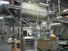 USED: Comac extrusion line. (1) Feeding system Matcon or Anag containers, servo lift Matcon (hydraulic lifting and positioning system), with 55 gallon (210 liter) Matcon buffer, screw feeder. (1) Com...