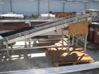 Used Vegetable Grading System, reportedly last used on tomatoes. Consists of 32 in wide grading belts, one 20 ft long, one 16 ft long, each with 3 side discharge belts. Also includes Cap Way inclined...