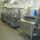 Used Wine Bottling Line, output 3000 bottles / hour, sizes 8 - 33 ounces (0.25 - 1 liter).  Comprised of:  (3) Forms 0.75 liter Bordeaux, 0.25 liter Bocksbeutel, 0.75 liter Bocksbeutel.  (1) Depallet...