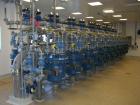 Used Pharmaceutical Kilo Production Facility consisting of:  Reactor Trains (3 OFF) - Used QVF Dedietrich approximately 80 liter capacity reactor trains which include Dedietrich 80 liter glass lined ...