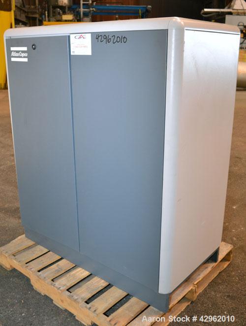 Used Atlas Copco Oil-Injected Rotary Screw Compressor, Model GA22. Air cooled, rated 119.5 CFM at 131 psi. Driven by a 22kw (30hp), 3/60/440-460 volt,3560 rpm motor. Includes a radial fan, oil separa...