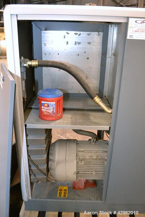 Used Atlas Copco Oil-Injected Rotary Screw Compressor, Model GA22. Air cooled, rated 119.5 CFM at 131 psi. Driven by a 22kw (30hp), 3/60/440-460 volt,3560 rpm motor. Includes a radial fan, oil separa...