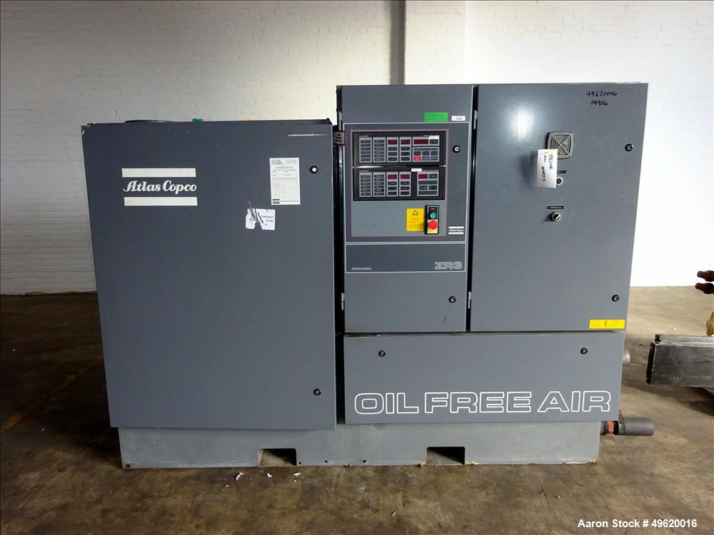Used Atlas Copco Water Cooled Oil Free Rotary Screw Compressor, Model ZR 3-63. Approximate capacity 790 CFM, 125 psi. Driven by a 200hp, 3/60/460 volt, 3580 rpm motor. With Elektronikon panel, serial...