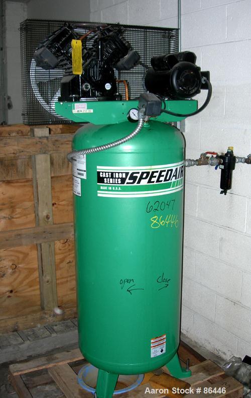 Used Speedaire reciprocating tank mounted air compressor, model 3JR76. Approximate 14.9 acfm at 135 psig, 16.7 cfm at 90 psi. Driven by an approximate 5 hp motor. 1/60/230 volt. Mounted on a 60 gallo...