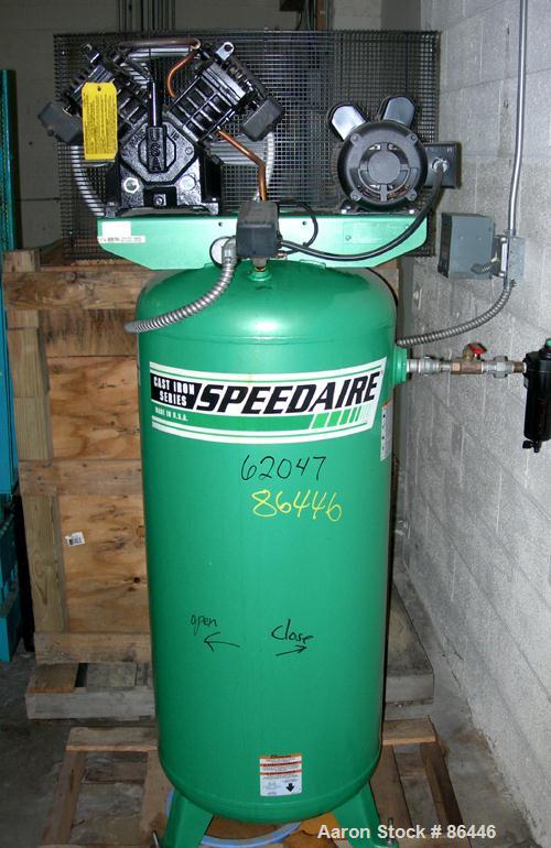 Used Speedaire reciprocating tank mounted air compressor, model 3JR76. Approximate 14.9 acfm at 135 psig, 16.7 cfm at 90 psi. Driven by an approximate 5 hp motor. 1/60/230 volt. Mounted on a 60 gallo...