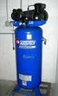 Used Campbell Hausfeld reciprocating tank mounted air compressor, model VT619503AJ. Approximate 11.7 acfm at 40 psig, 10.2 cfm at 90 psi. Driven by an approximate 5 hp motor. 1/60/240 volt. Mounted o...