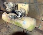Used Ingersoll Rand Reciprocating Air Compressor, Model 2475D5. Rated 17.1 cfm at 90 psi. Driven by a 5hp, 3/60/200 volt, 1740 rpm motor. Mounted on an approximate 80 gallon horizontal tank. Serial# ...