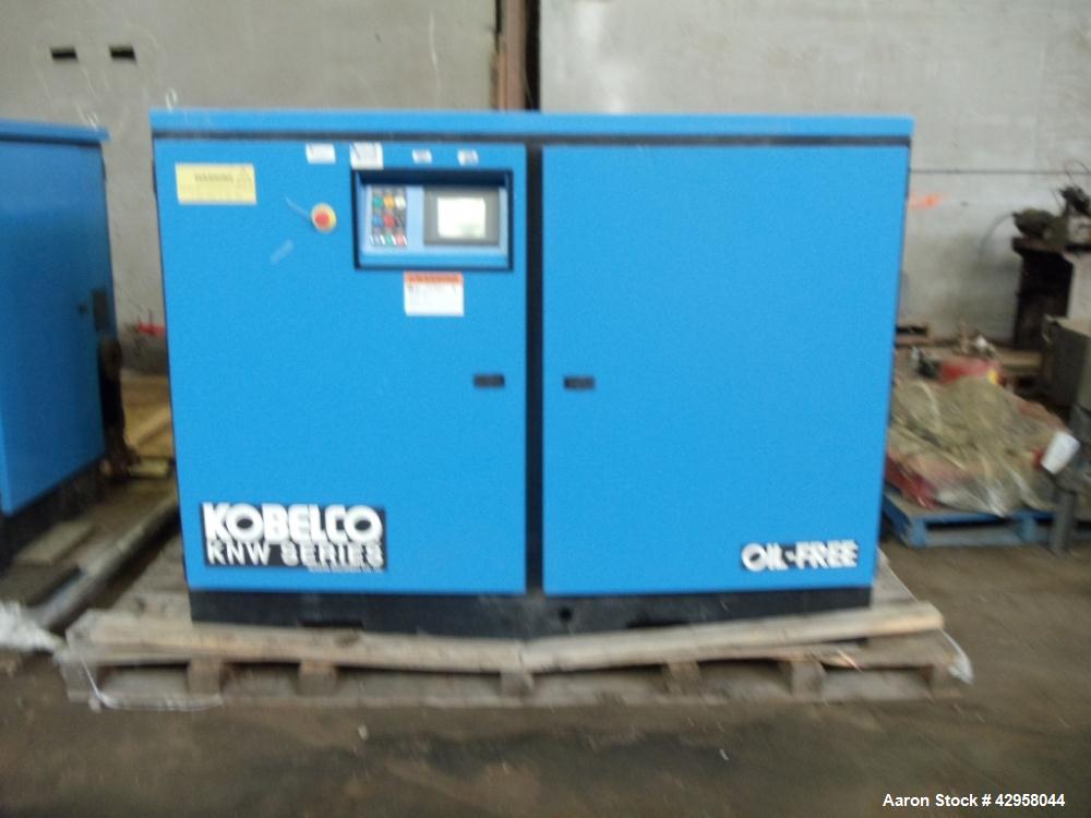 Used Kobelco air compressor, KNW series, model KNW1-B/H/S, two stage, water cooled, 125 hp, 460 volt, 150 psig, 504 cfm with controls, serial# 94E0679. PRICE INCLUDES A 15% BUYERS PREMIUM.