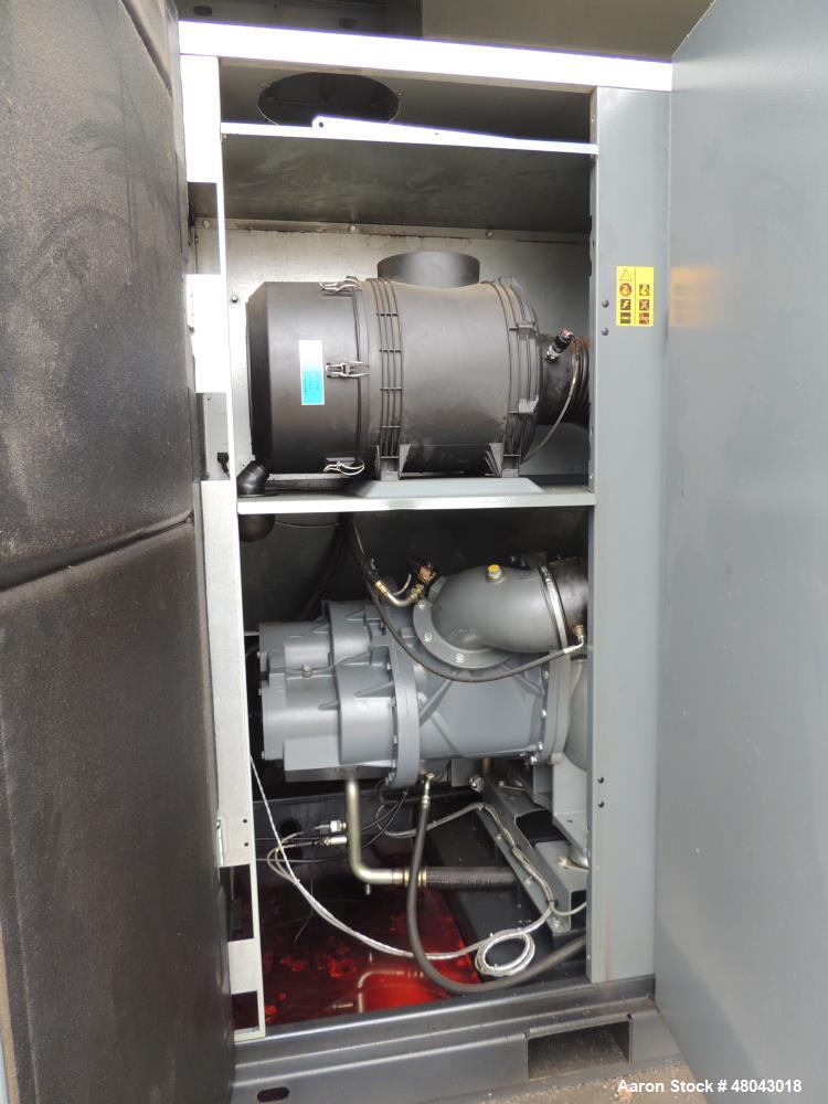Copco del Atlas utiliza una etapa lubricados de tornillo compresor de aire. Modelo GA110VSP-AP. nominal 192 a 701 CFM @125 P...