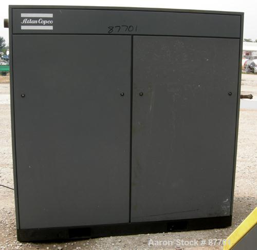 USED: Atlas Copco Stationary Rotary Screw Compressor, model GA55W. Rated max 132 psi, water cooled. Capacity approximately 328 cfm at 125 psi. Driven by a 75 hp, 3/60/230/460 volt, 3550 rpm motor. Un...