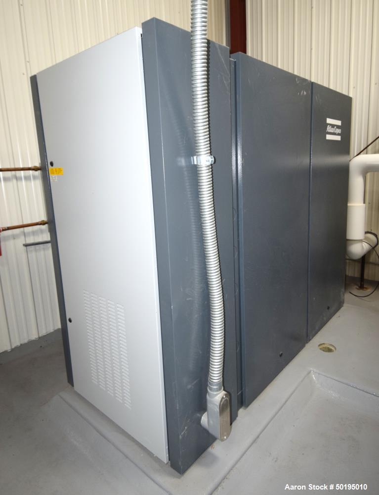 Used Atlas Copco Oil-Injected Rotary Screw Compressor, Model GA75VSF. Rated 518.5 CFM at 185 psi, 100hp motor, running time 14 hours on meter, Elektronikon II controller. Serial# API653263,  built 20...