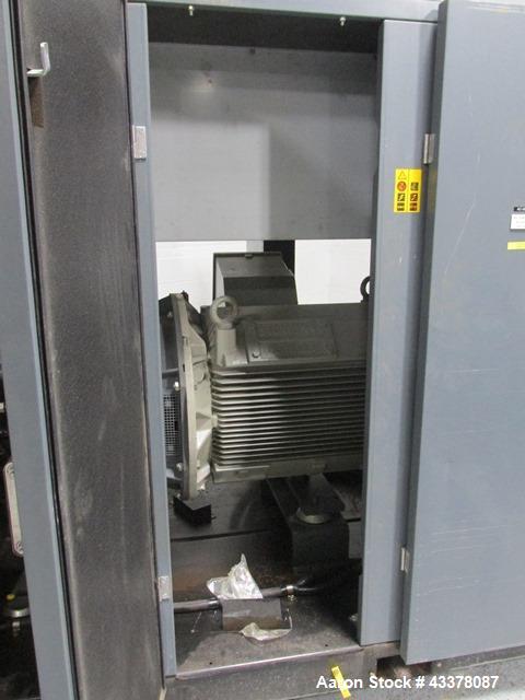 Used Atlas Copco Water Cooled Oil Free Rotary Screw Compressor, Model ZR250. Rated 1100 CFM, 125 psi. Driven by a 300hp, 460 volt motor. Includes an Atlas Copco MD600 air dryer, serial# AIF088363, an...