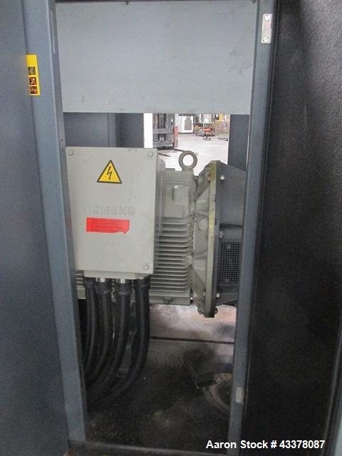 Used Atlas Copco Water Cooled Oil Free Rotary Screw Compressor, Model ZR250. Rated 1100 CFM, 125 psi. Driven by a 300hp, 460 volt motor. Includes an Atlas Copco MD600 air dryer, serial# AIF088363, an...