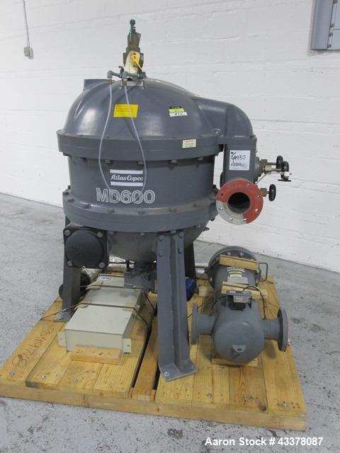 Used Atlas Copco Water Cooled Oil Free Rotary Screw Compressor, Model ZR250. Rated 1100 CFM, 125 psi. Driven by a 300hp, 460 volt motor. Includes an Atlas Copco MD600 air dryer, serial# AIF088363, an...