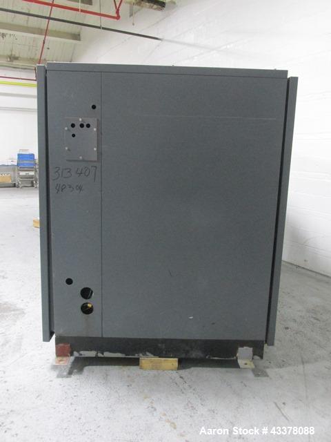 Used Atlas Copco Water Cooled Oil Free Rotary Screw Compressor, Model ZR250. Rated 1100 CFM, 125 psi. Driven by a 300hp, 460 volt motor. Includes an Atlas Copco MD600 air dryer, serial# AID011985, an...