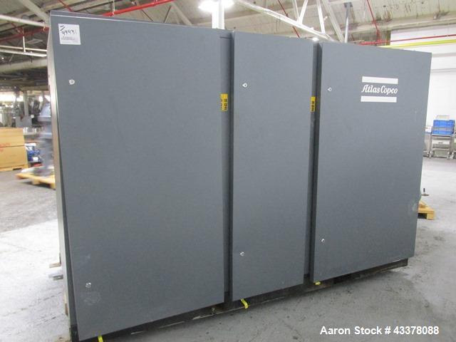 Used Atlas Copco Water Cooled Oil Free Rotary Screw Compressor, Model ZR250. Rated 1100 CFM, 125 psi. Driven by a 300hp, 460 volt motor. Includes an Atlas Copco MD600 air dryer, serial# AID011985, an...