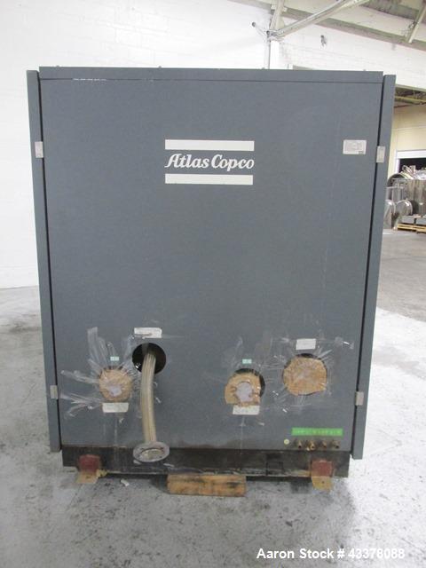 Used Atlas Copco Water Cooled Oil Free Rotary Screw Compressor, Model ZR250. Rated 1100 CFM, 125 psi. Driven by a 300hp, 460 volt motor. Includes an Atlas Copco MD600 air dryer, serial# AID011985, an...
