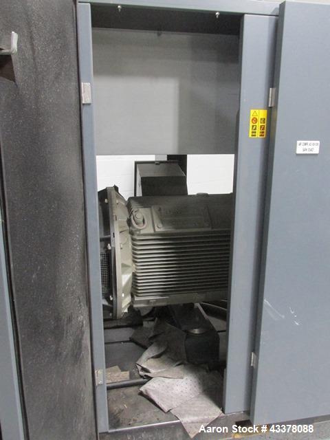 Used Atlas Copco Water Cooled Oil Free Rotary Screw Compressor, Model ZR250. Rated 1100 CFM, 125 psi. Driven by a 300hp, 460 volt motor. Includes an Atlas Copco MD600 air dryer, serial# AID011985, an...