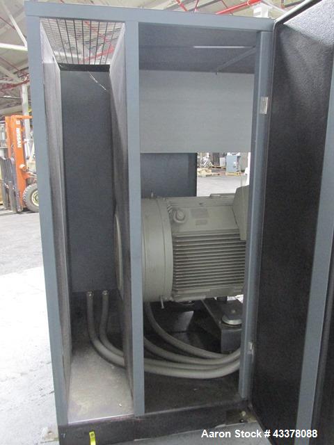 Used Atlas Copco Water Cooled Oil Free Rotary Screw Compressor, Model ZR250. Rated 1100 CFM, 125 psi. Driven by a 300hp, 460 volt motor. Includes an Atlas Copco MD600 air dryer, serial# AID011985, an...