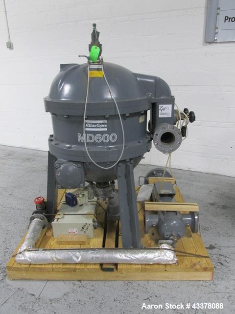 Used Atlas Copco Water Cooled Oil Free Rotary Screw Compressor, Model ZR250. Rated 1100 CFM, 125 psi. Driven by a 300hp, 460 volt motor. Includes an Atlas Copco MD600 air dryer, serial# AID011985, an...