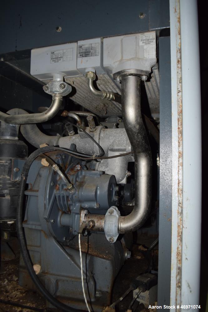 Used Atlas Copco Oil Free Rotary Screw Compressor, Model ZT 22. Air cooled, 117.2 CFM at 124 psi. Driven by a 30hp motor. Includes an Elektronikon controller. Serial# AII705773, built 2006.