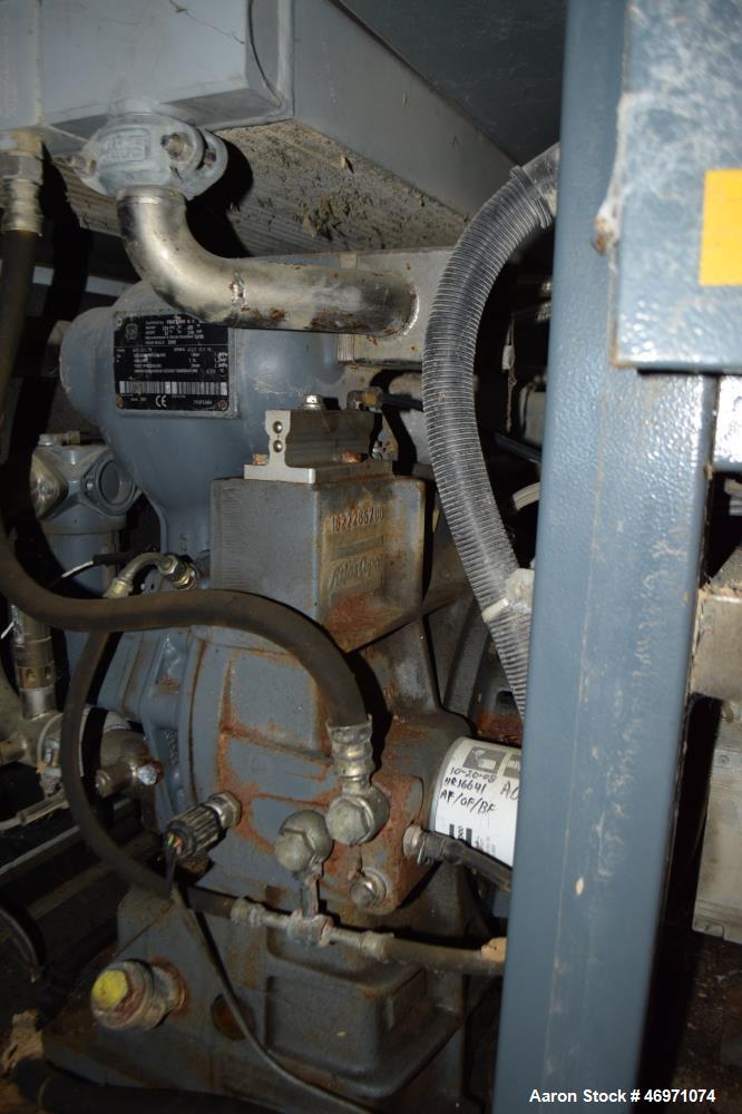 Used Atlas Copco Oil Free Rotary Screw Compressor, Model ZT 22. Air cooled, 117.2 CFM at 124 psi. Driven by a 30hp motor. Includes an Elektronikon controller. Serial# AII705773, built 2006.