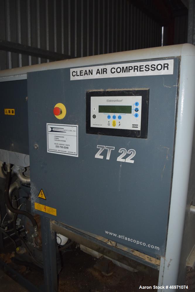 Used Atlas Copco Oil Free Rotary Screw Compressor, Model ZT 22. Air cooled, 117.2 CFM at 124 psi. Driven by a 30hp motor. Includes an Elektronikon controller. Serial# AII705773, built 2006.