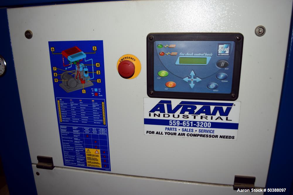 Used FIAC Encapsulated Rotary Screw Air Compressor, Model CRSD 20/500. 65 CFM, driven by an approximate 20hp motor. Includes an air dryer, and receiving tank. Serial# BG-62641, built 2007.