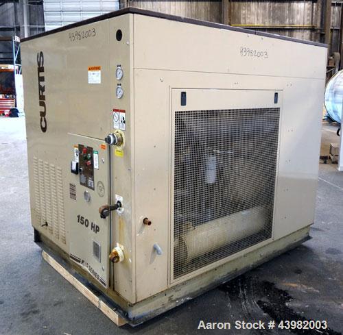 Used Curtis RS Series Rotary Screw Compressor, Model R/S-150D-A/E-E75G. Air cooled, rated 706 cfm at 125 psi. Driven by a 150 hp, 3/60/460 volt, 1780 rpm motor.  Includes a control panel and sound en...