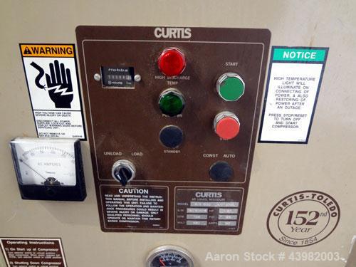 Used Curtis RS Series Rotary Screw Compressor, Model R/S-150D-A/E-E75G. Air cooled, rated 706 cfm at 125 psi. Driven by a 150 hp, 3/60/460 volt, 1780 rpm motor.  Includes a control panel and sound en...