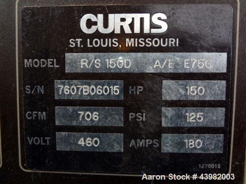 Used Curtis RS Series Rotary Screw Compressor, Model R/S-150D-A/E-E75G. Air cooled, rated 706 cfm at 125 psi. Driven by a 150 hp, 3/60/460 volt, 1780 rpm motor.  Includes a control panel and sound en...