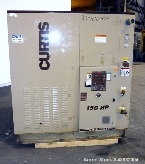 Used Curtis RS Series Rotary Screw Compressor, Model R/S-150D-A/E-E75G. Air cooled, rated 706 cfm at 125 psi. Driven by a 150 hp, 3/60/460 volt, 1780 rpm motor.  Includes a control panel and sound en...