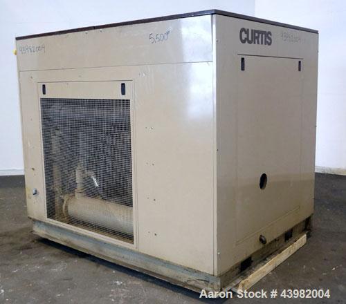 Used Curtis RS Series Rotary Screw Compressor, Model R/S-150D-A/E-E75G. Air cooled, rated 706 cfm at 125 psi. Driven by a 150 hp, 3/60/460 volt, 1780 rpm motor.  Includes a control panel and sound en...
