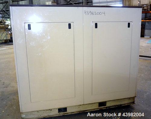 Used Curtis RS Series Rotary Screw Compressor, Model R/S-150D-A/E-E75G. Air cooled, rated 706 cfm at 125 psi. Driven by a 150 hp, 3/60/460 volt, 1780 rpm motor.  Includes a control panel and sound en...