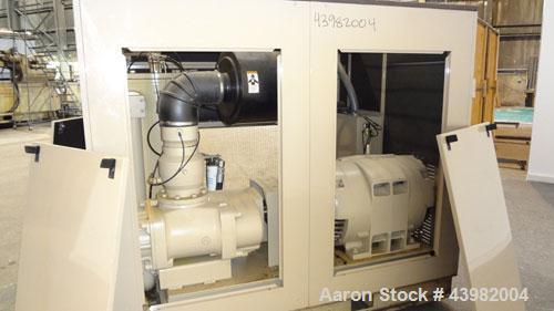 Used Curtis RS Series Rotary Screw Compressor, Model R/S-150D-A/E-E75G. Air cooled, rated 706 cfm at 125 psi. Driven by a 150 hp, 3/60/460 volt, 1780 rpm motor.  Includes a control panel and sound en...