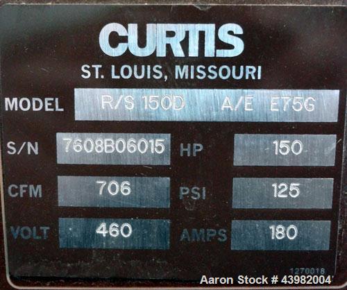 Used Curtis RS Series Rotary Screw Compressor, Model R/S-150D-A/E-E75G. Air cooled, rated 706 cfm at 125 psi. Driven by a 150 hp, 3/60/460 volt, 1780 rpm motor.  Includes a control panel and sound en...