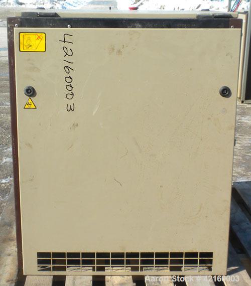 Used Curtis-Toledo Single Stage Rotary Screw Compressor, Model RS10. Oil cooled, 38.5 CFM at 115 psi at 4940 rpm. Driven by a 10 hp motor.Includes a control panel, and sound enclosure. Requires air t...