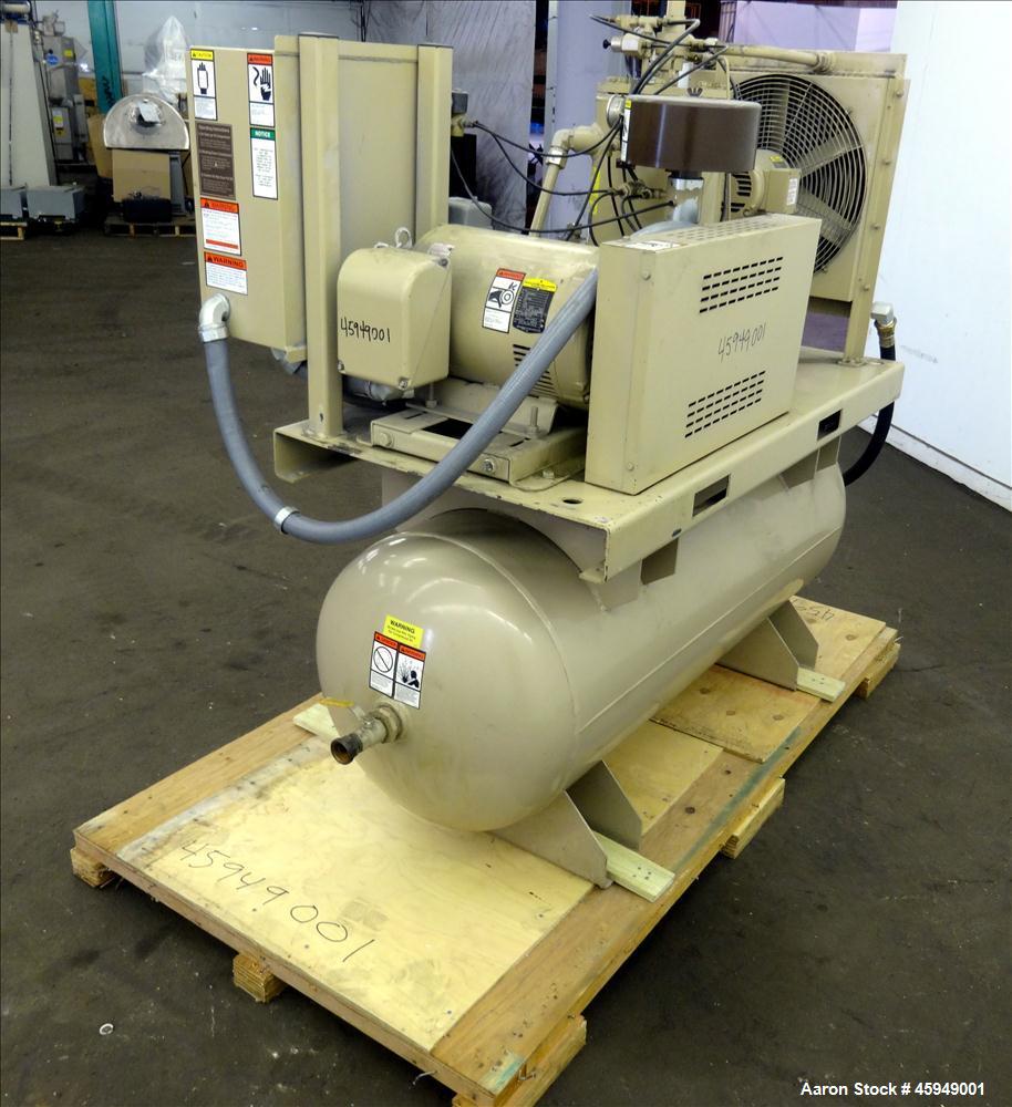 Used Curtis Rotary Screw Air Compressor, 120 Gallon, Model RS25A A-E B101. Rated 104 CFM at 125 psi. Driven by a 25hp,  3/60/200 volt, 1760 rpm motor. Curtis-Toledo compressor model B101-V001. Has mu...