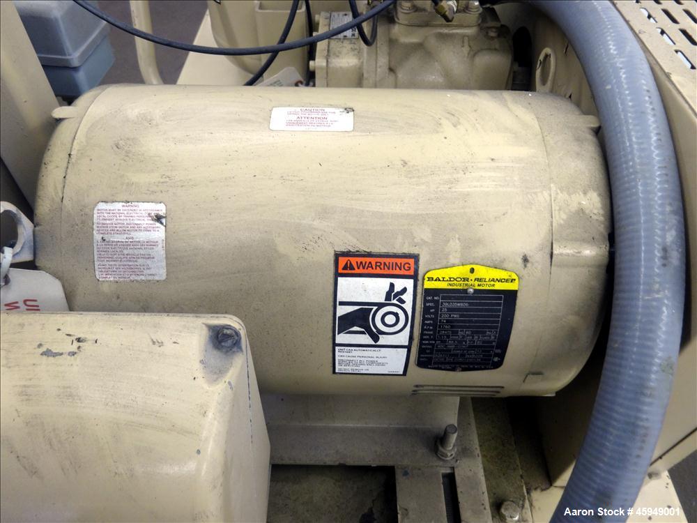 Used Curtis Rotary Screw Air Compressor, 120 Gallon, Model RS25A A-E B101. Rated 104 CFM at 125 psi. Driven by a 25hp,  3/60/200 volt, 1760 rpm motor. Curtis-Toledo compressor model B101-V001. Has mu...
