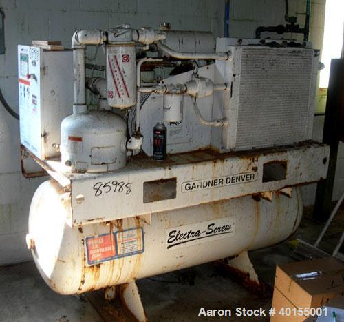 Used:  Gardner Denver rotary screw tank mounted air compressor, model EBE99K. Approximately 92 acfm at 125 psig. Air cooled. Driven by an approximate 25 hp motor. Mounted on a 100 gallon horizontal t...