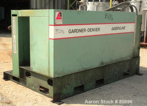 Used Gardner Denver Rotary Screw Compressor, Model EDEQJB-AAGA99C, air cooled. Approximately 221 cfm at 100 psi at 4795 rpm. Driven by a 50 hp, 3/60/460 volt, 1725 rpm motor. Unit includes control pa...