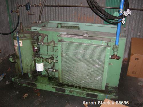Used Gardner Denver Rotary Screw Compressor, Model EDEQJB-AAGA99C, air cooled. Approximately 221 cfm at 100 psi at 4795 rpm. Driven by a 50 hp, 3/60/460 volt, 1725 rpm motor. Unit includes control pa...