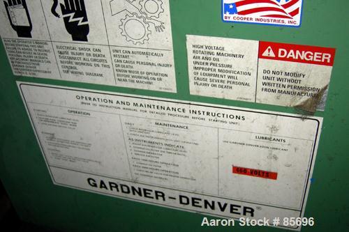 Used Gardner Denver Rotary Screw Compressor, Model EDEQJB-AAGA99C, air cooled. Approximately 221 cfm at 100 psi at 4795 rpm. Driven by a 50 hp, 3/60/460 volt, 1725 rpm motor. Unit includes control pa...