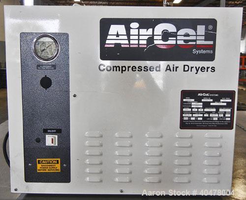 Used Hydrovene AirCentre Air Compressor, model HV07. Approximately 44 cfm at 7 bar, max 145 psi. Driven by a 10 hp motor. Includes an Air Cel Systems compressed air dryer, model ACR-25, 1/4 hp, 115 v...