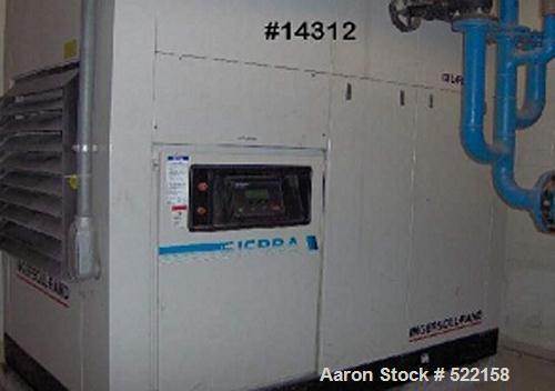 USED: Ingersoll Rand rotary screw air compressor, model Sierra H125.Two stage, oil free, 535 cfm @ 125 psig, air cooled with enclosure.Manufactured in 1990. 60,000 hours of use.