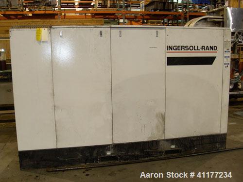 Used Ingersoll-Rand Rotary Screw Air Compressor, Model SSR-EP200. Size 200 HP. Capacity 892 CFM, single stage unit. Rated operating pressure 125 PSI, max discharge pressure 128 PSI, max modulate pres...